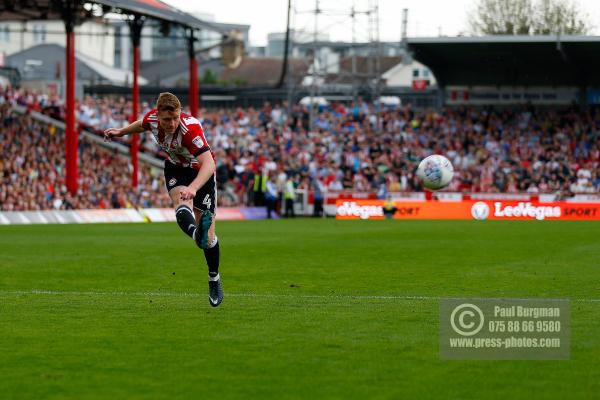 21/04/2018. Brentford v Queens Park Rangers SkyBet Championship Action from Griffin Park. Brentford's Lewis MACLEOD crosses