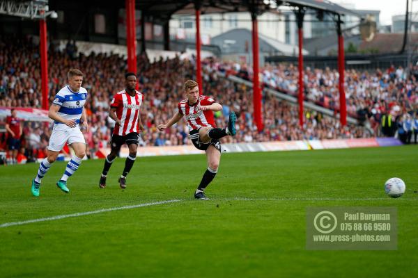 21/04/2018. Brentford v Queens Park Rangers SkyBet Championship Action from Griffin Park.  Brentford's Lewis MACLEOD crosses