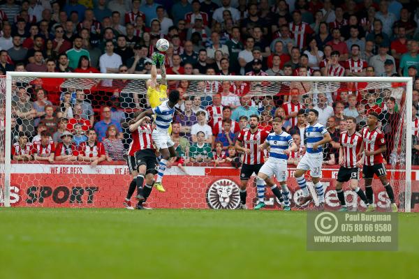 21/04/2018. Brentford v Queens Park Rangers SkyBet Championship Action from Griffin Park. Brentford's Goalkeeper Daniel BENTLEY punches